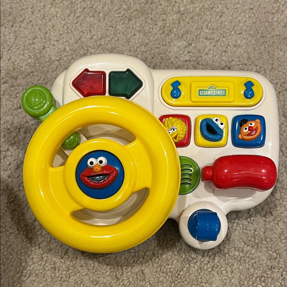 Vintage 1997 Sesame Street Elmo driving wheel toy